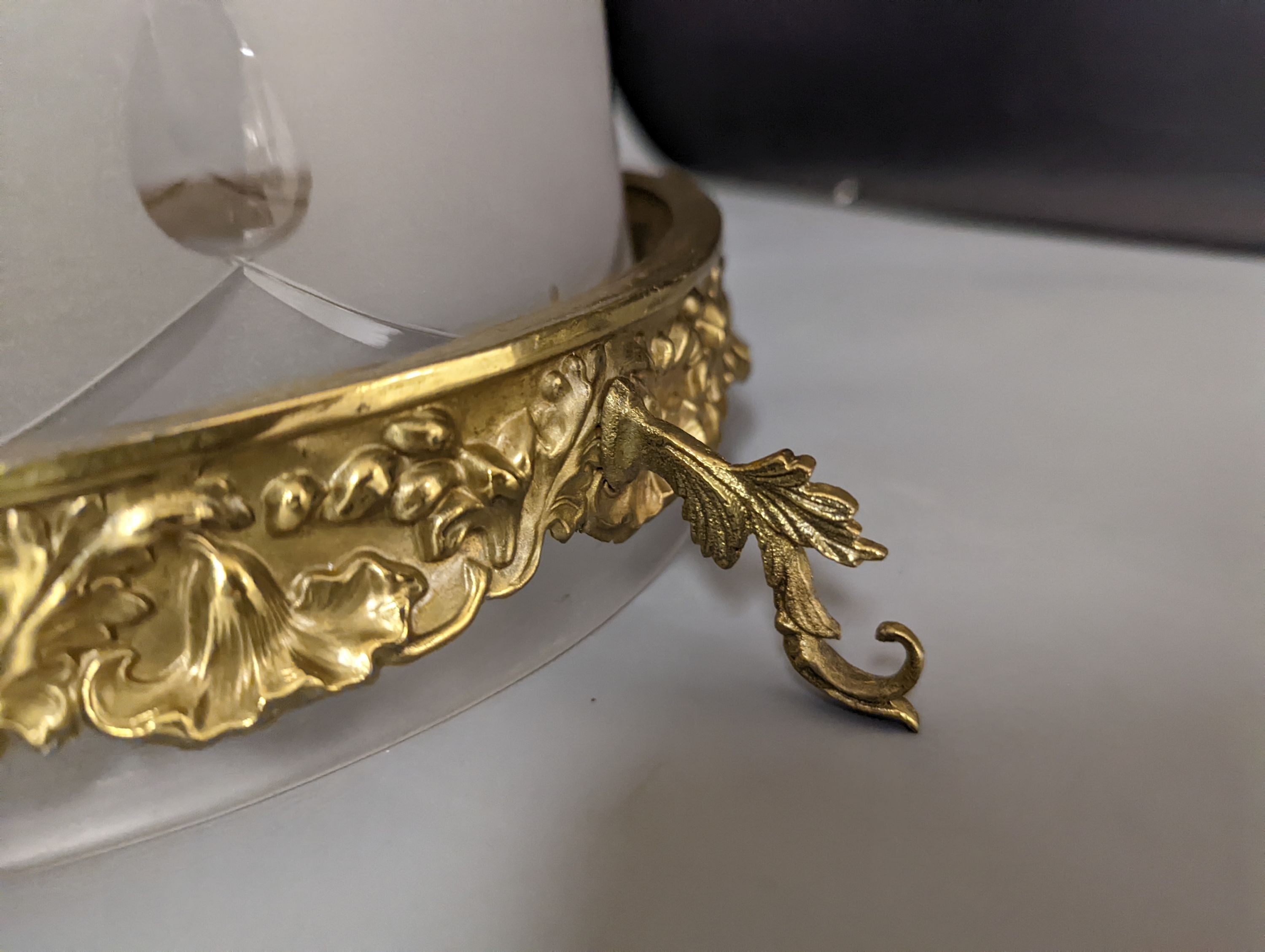 An overlaid etched glass and brass hanging light, 36 cms high, not including chain.